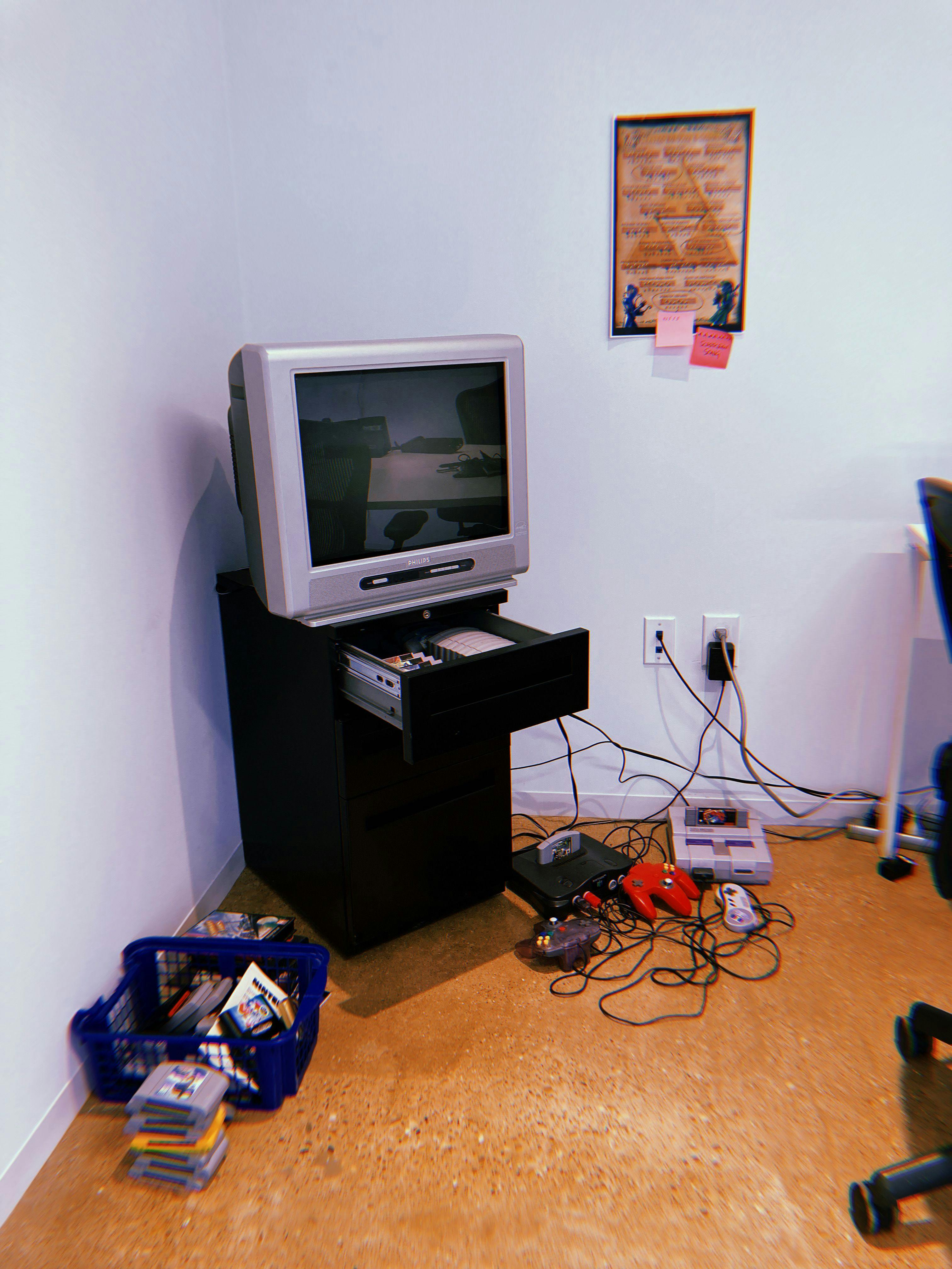 Nintendo 64 in the corner of the empty office. Bet you can't beat our Starfox runs.