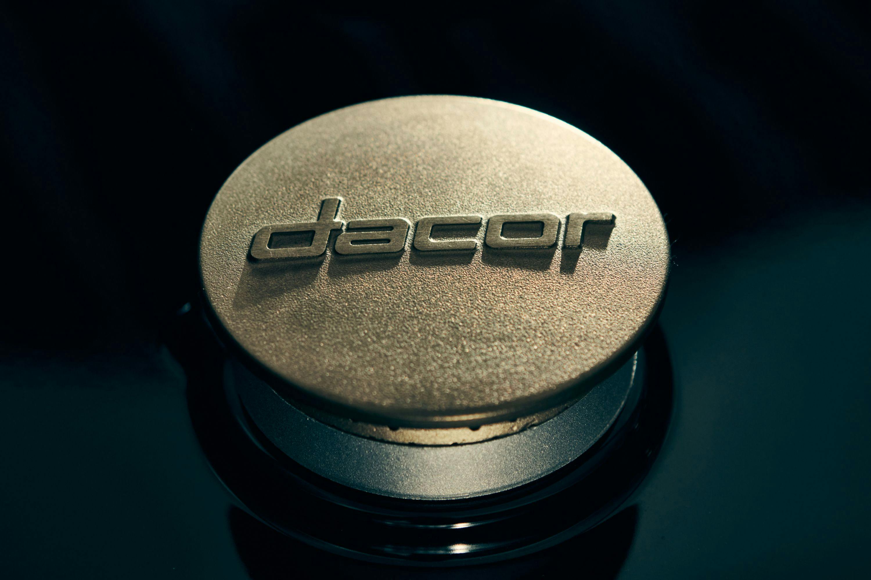 Stove burner emblazoned with the Dacor logo 