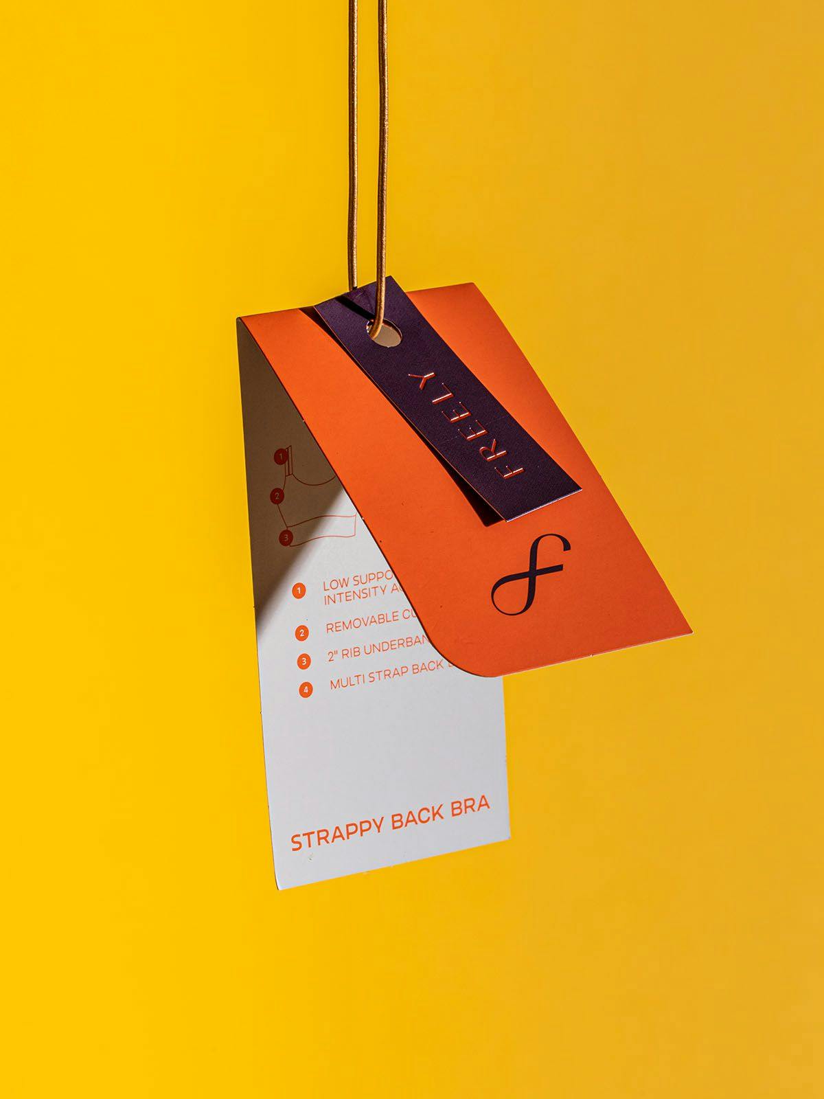 Freely's Product Tag Against a Mustard Yellow Background