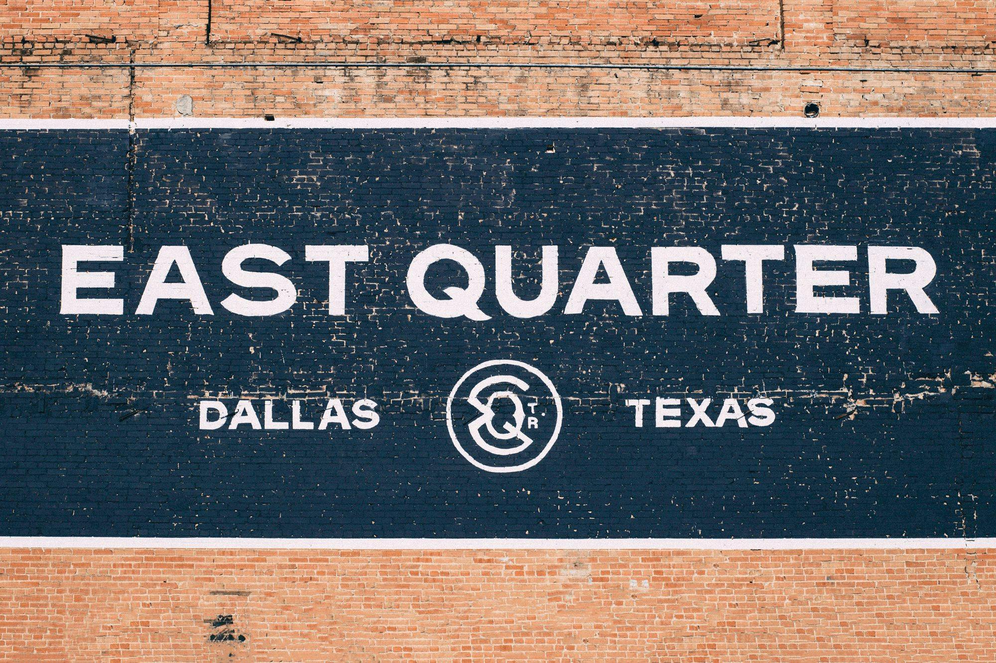 East Quarter, Dallas, Texas painted on a brick wall