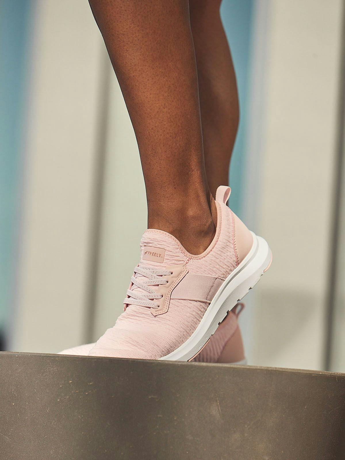 Woman Wearing Pink Athletic Shoes