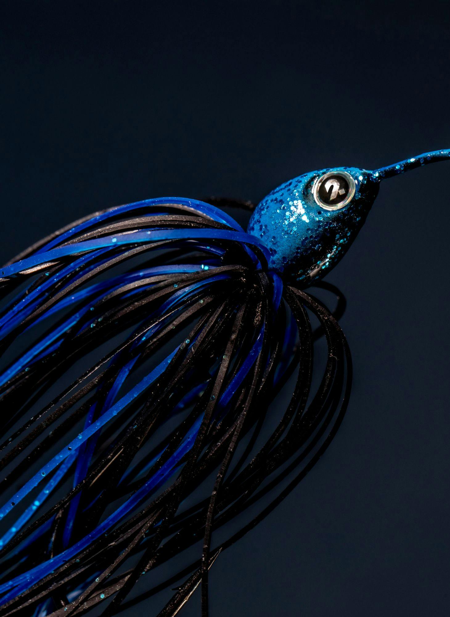 A blue and black fishing lure