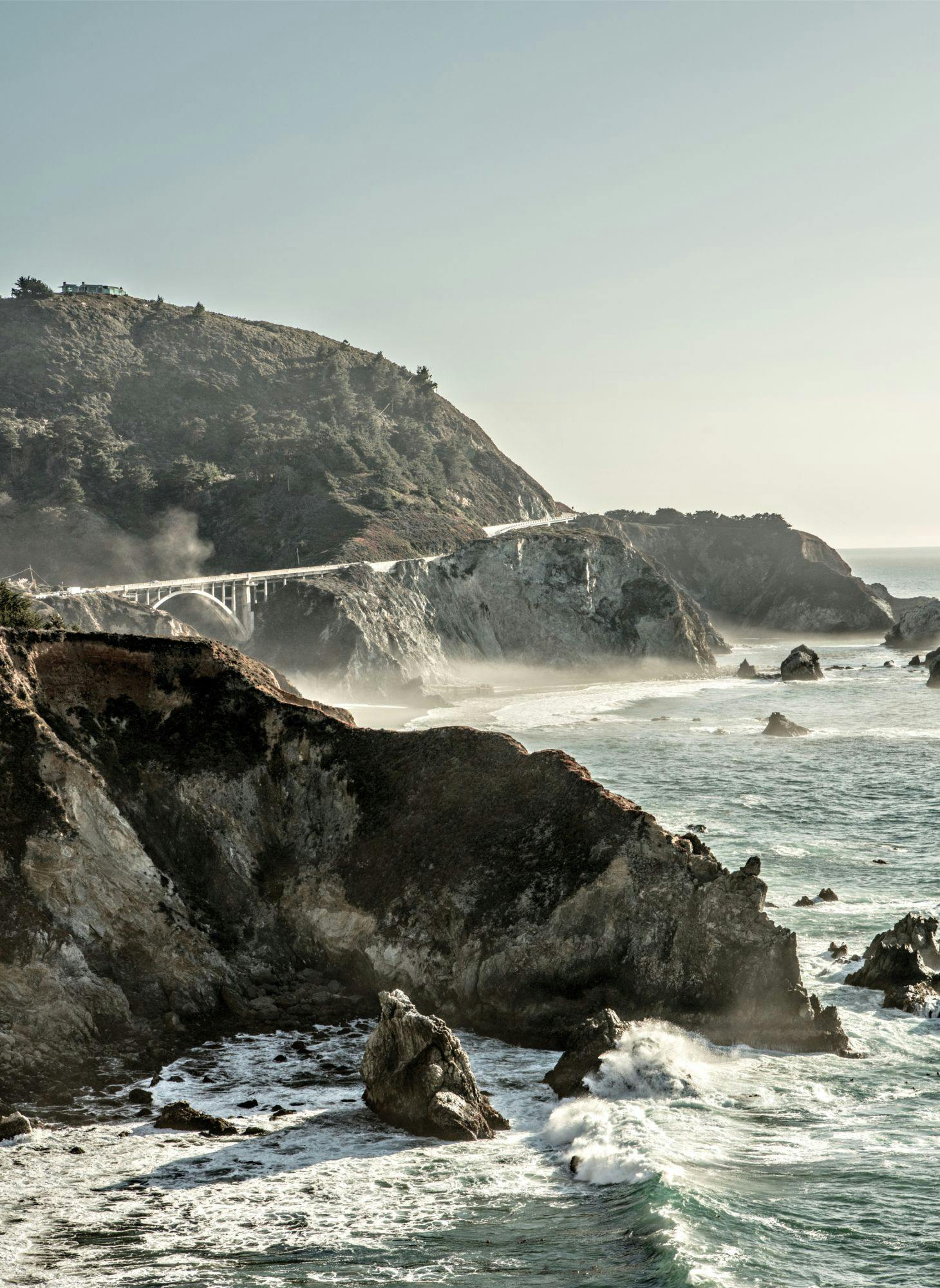 A rocky beach near an oceanside cliff