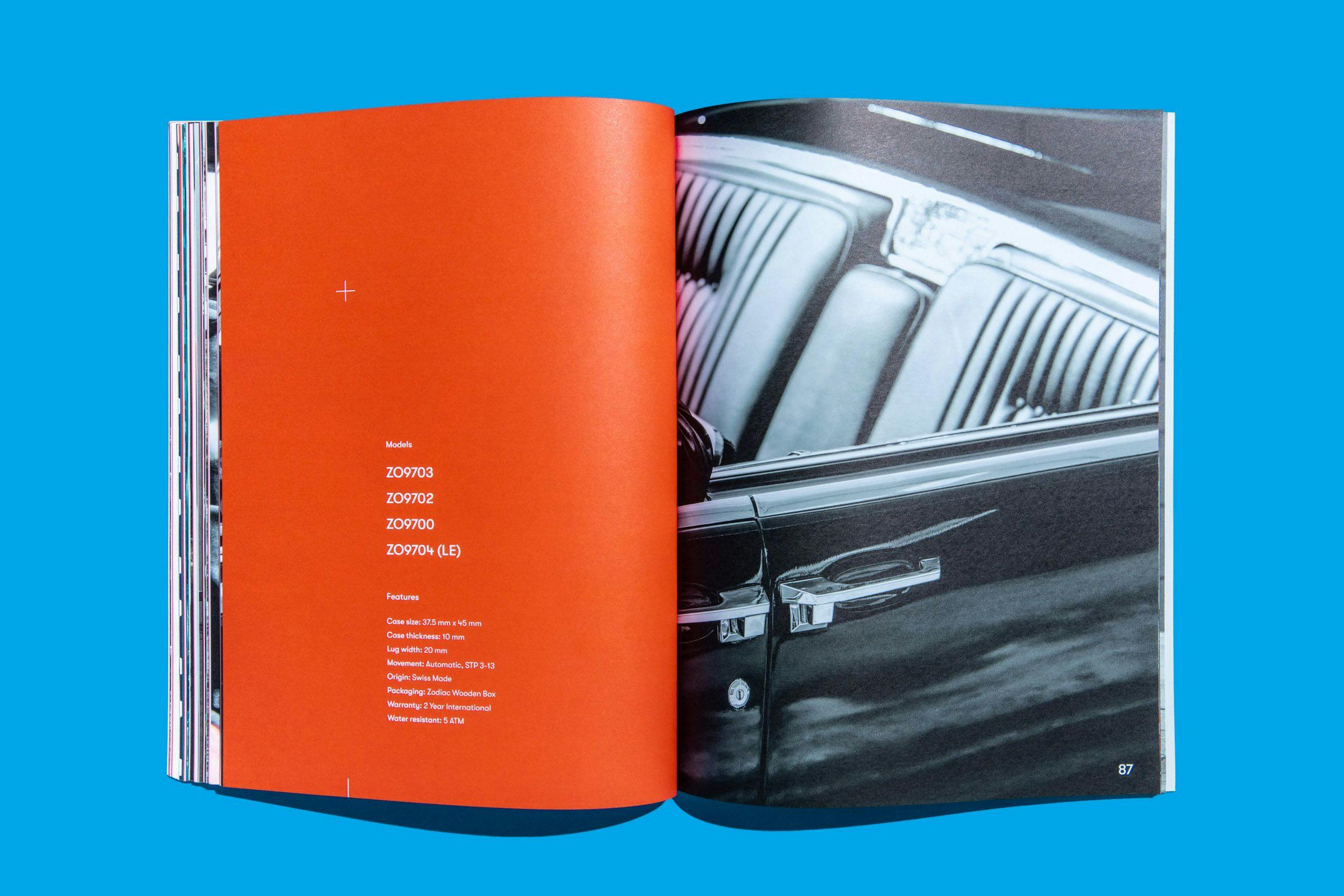 Vibrant orange and monochromatic pages featured in the Zodiac Watches: Brand Book